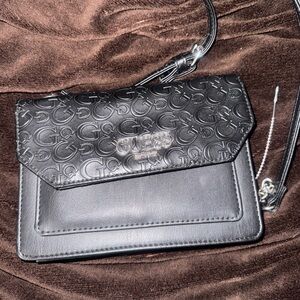 Guess Bowie crossbody featuring a debossed logo design